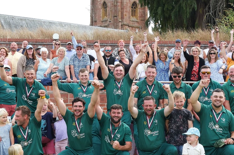 Holford in front of their supporters after winning the Minor Cup at the County Ground