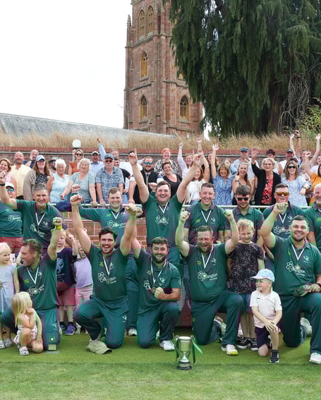 Holford in front of their supporters after winning the Minor Cup at the County Ground