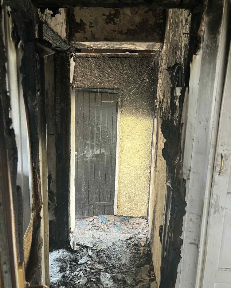 Extensive fire damage can be seen at the rear of Carla Cridland's home in Watchet.