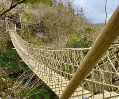 Treehouse Life builds rope bridges such as this one.