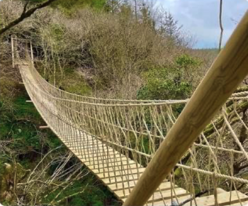 Treehouse Life builds rope bridges such as this one.