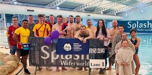 Holiday resort staff raise £28k for cancer centre