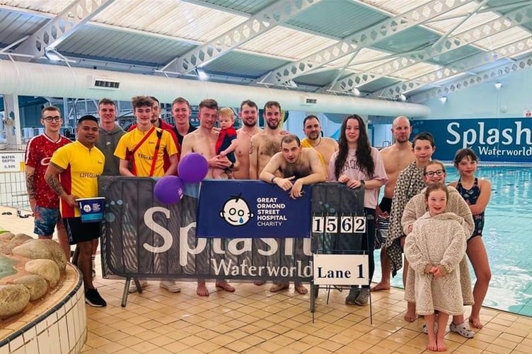 Butlin's staff in Minehead who took part in a swimathon to help raise £1,500 for Great Ormond Street Hospital's new children's cancer centre.