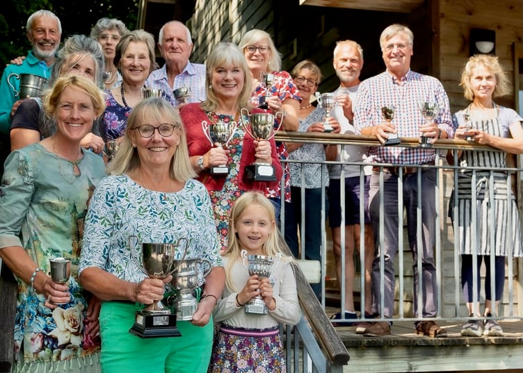 Some of the cup winners at this year's Wootton Courtenay Flower and Produce Show. PHOTO: Peter Clapham.