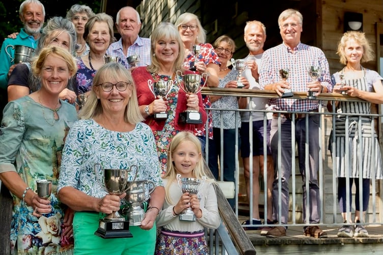 Some of the cup winners at this year's Wootton Courtenay Flower and Produce Show. PHOTO: Peter Clapham.