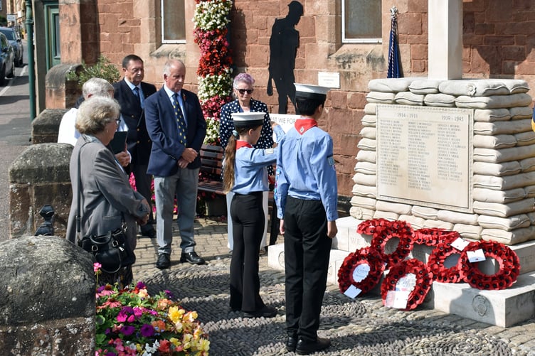 A salute from a young Watchet Sea Scout during the town's VJ Day 80th anniversary service on Friday.
