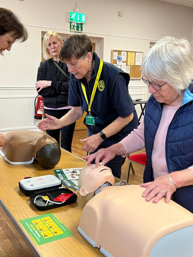 The Bicknoller WI 'restart a heart' session with trainers from Dorset and Somerset Air Ambulance.