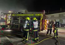 Fire crews from eight stations rush to fire in flat above village shop