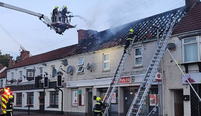 Firefighters tackle a blaze in a flat above Cannington's Spar shop early on Saturday.