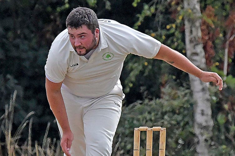 Callum White bowls for Ashbrittle against Brompton Ralph
