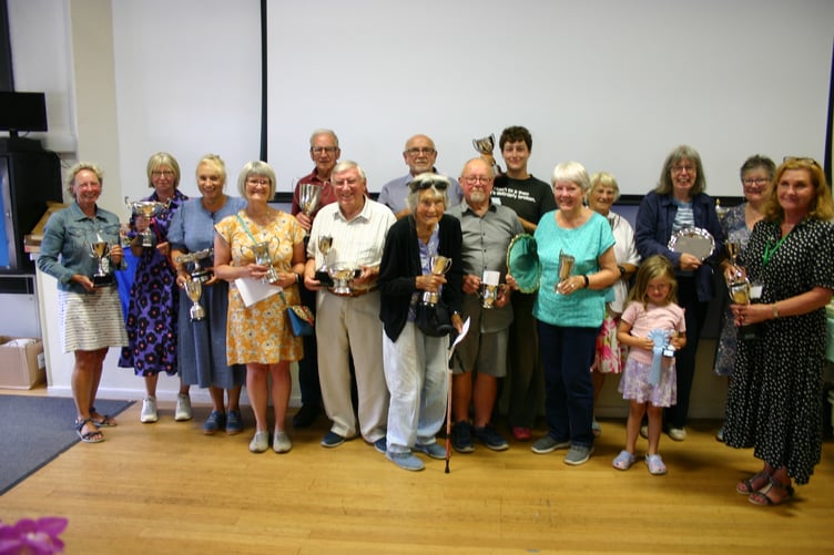 Some of the trophy winners at the 2025 Minehead Gardening Club Flower Show.