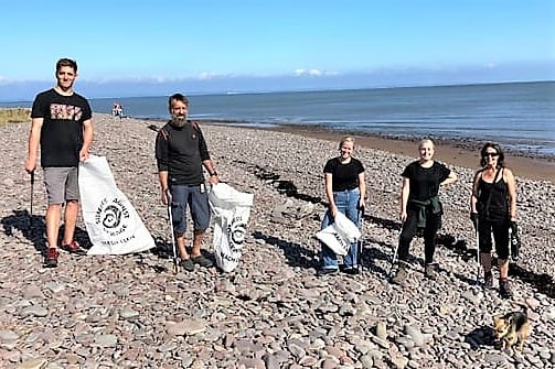 Volunteers taking part in a previous Dunster Bach clean-up.