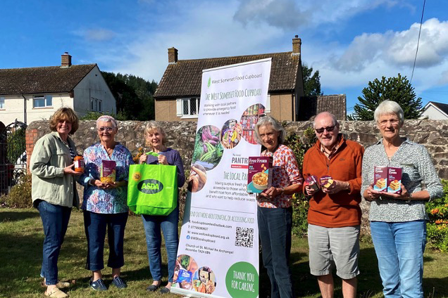 West Somerset Food Cupboard team leader Sara Trigg and volunteers with Asda special diet products.