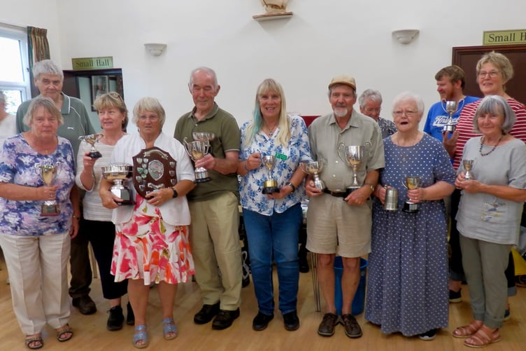 Some of the trophy winners at the 2025 Carhampton Flower and Produce Show.