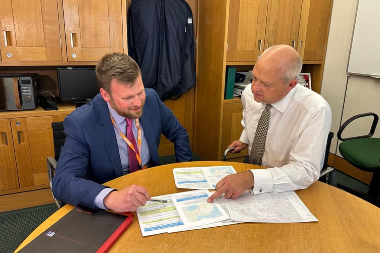 Campaigner and Exmoor farmer James Wright (left) with Conservative Shadow Railways Minister Jerome Mayhew discussing a potential reconnection to the mainline for the West Somerset Railway.