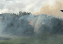 Fire threatens homes & thousands without power after Watchet high voltage cables snap