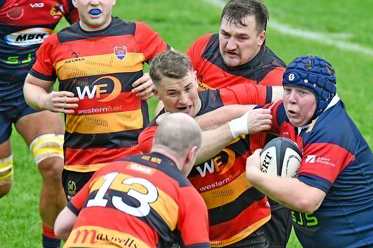 Jack Thorne, with ball, in action for Wiveliscombe against Bridgwater & Albion