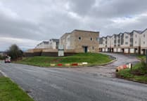 Councillor wants council to buy part-finished Minehead homes for local people