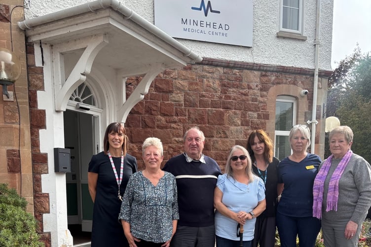 Celebrating the award of a new contract to run Minehead Medical Centre are (left to right) operations manager Katheryn Antonelli, PPG members Catherine Hurd and Ray Wheeler, PPG chairman Barbara Seacombe, patient navigator Kathy Tyler, advanced nurse practitioner Tracey Bailey, and PPG vice-chairman Linda Vasey.