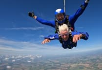 Octogenarian says there was a "fantastic view" during epic parachute jump