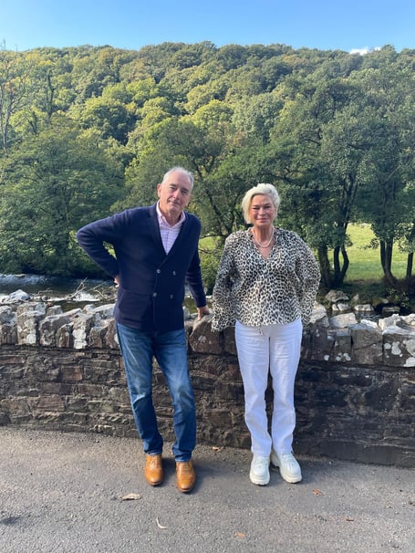 Rachel Gilmour MP and DWLCT Lead Trustee Philip Hull at Dulverton Weir