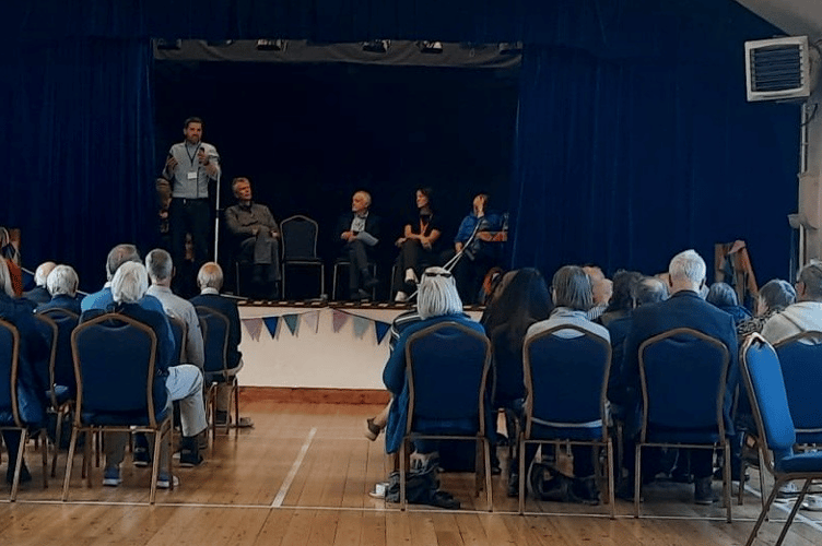 Guests attending a community conversations afternoon in Porlock.
