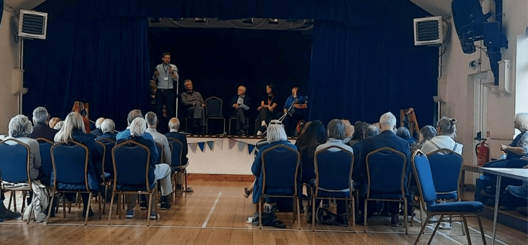 Guests attending a community conversations afternoon in Porlock.