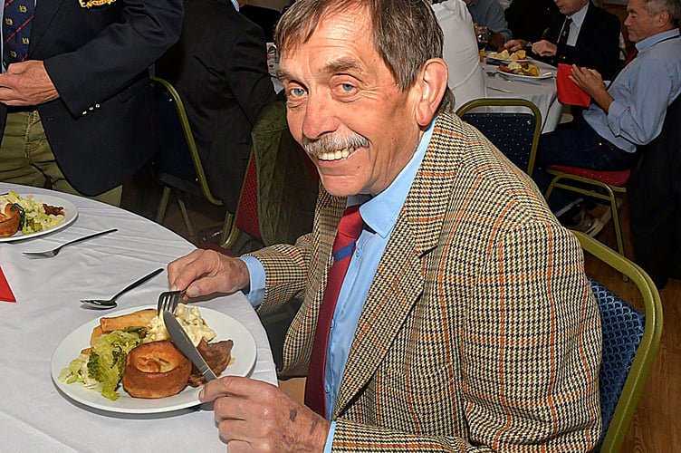 Robert Burston tucks into his meal at a Past Players lunch before Wiveliscombe's home game against Penryn