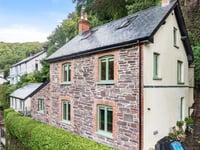 Home features wonderful renovations and riverside views