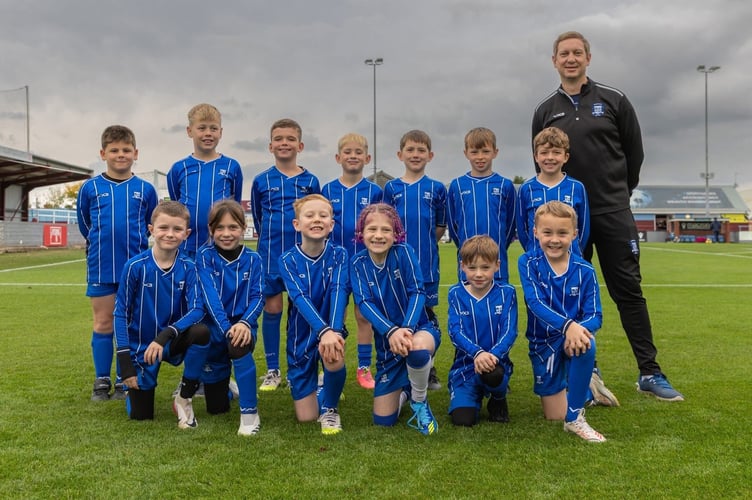 Minehead U9s - mascots at Taunton Town's home game against Sholing FC