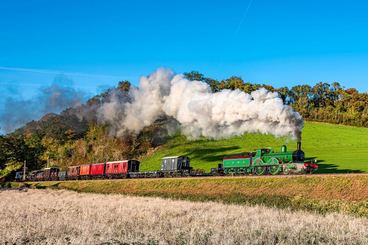 Locomotive T3 4-4-0 No 563 steams through the West Somerset countryside.