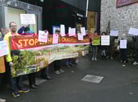 Huge protest as councillors discuss amended housing proposals