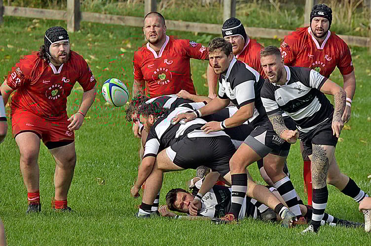 Minehead Barbarians (black hoops) in action earlier this season