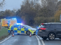 Driver rescued from car in water-filled ditch