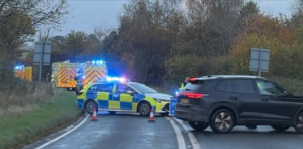 Driver rescued from car in water-filled ditch