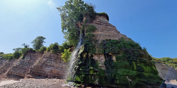The famed waterfall on St Audries beach lies on the route of the 80 miles in eight days challenge.