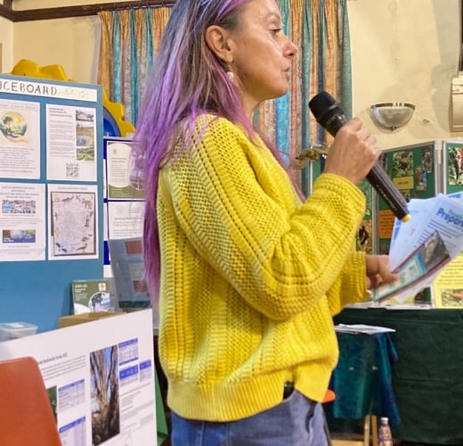 Somerset Rivers Authority's Bel Deering speaking on flood resilience at the Minehead Climate Fair.