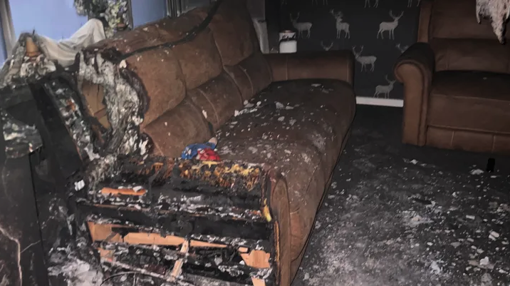 Fire damage in the living room of Andy and Chantelle Scott's family home in Doniford.