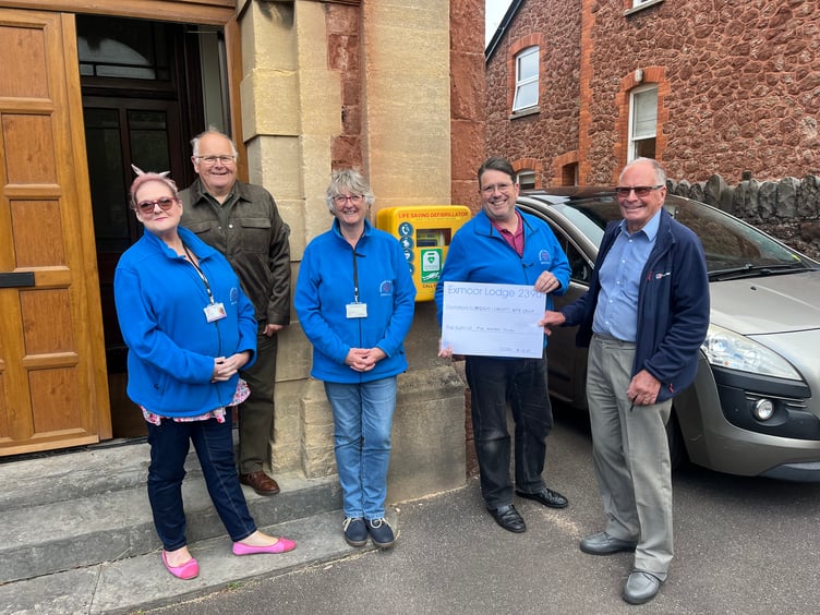 Maintenance of a defibrillator outside Minehead's masonic hall is being supported by masons.