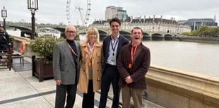 Adult reading graduate Thomas tours Parliament