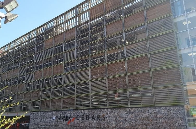 Musgrove Park Hospital's multi-storey car park has been closed after a car smashed into a wall on the first floor of the building.