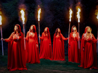 Torchlit procession as village welcomes back Mediaeval Baebes