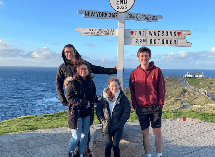 Georgia Watson and her family at Land's End, where she completed her fund-raising walk for Diabetes UK.