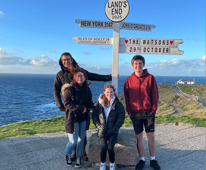 Georgia Watson and her family at Land's End, where she completed her fund-raising walk for Diabetes UK.