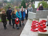 Wind, rain, and silence as Armistice Day proudly upheld