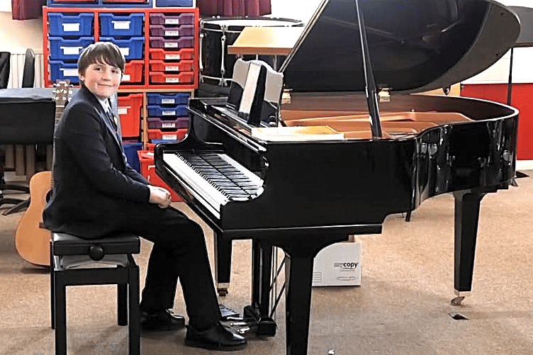 Musical prodigy River Peryer, aged 11, who is to perform in Dunster.