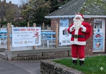 Minehead Rotary raising charity funds with sea front Santa fun run