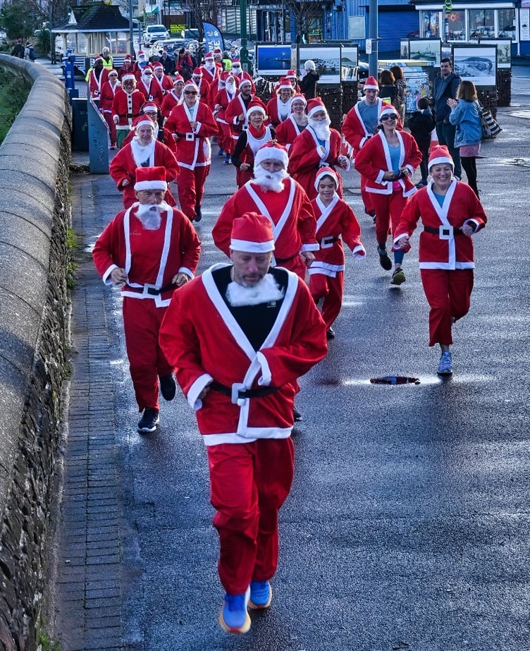 Some of last year's Minehead Rotary Santa fun runners.