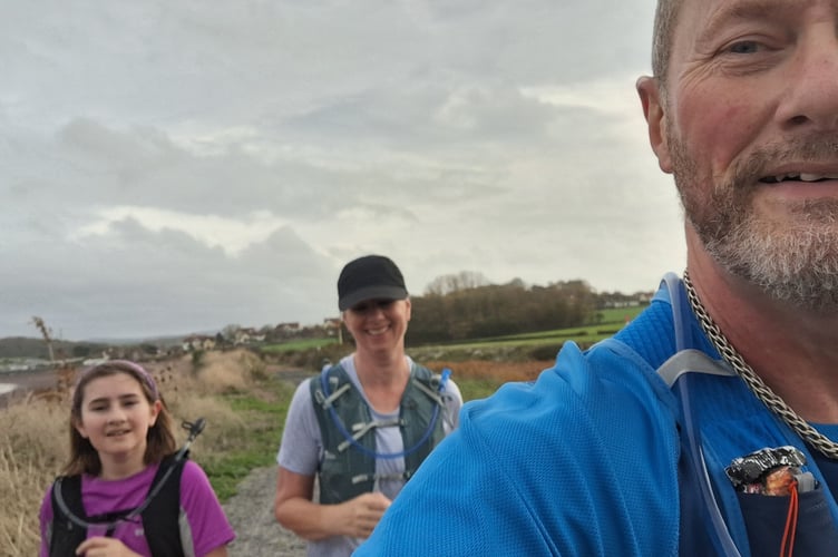 Darcey Curran training with mother Jack and father Mark for her charity fund-raising Bridgwater to Taunton canal run.