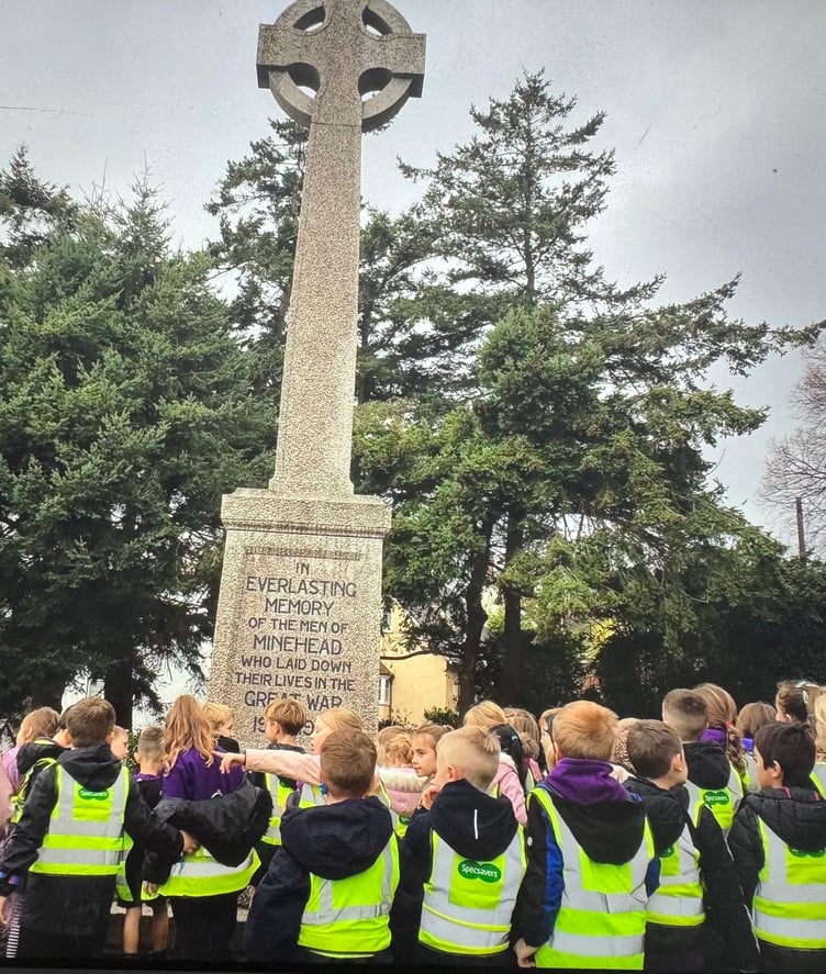 Some of the pupils of Minehead's first schools attending the town's war memorial for this year's Remembrance events.